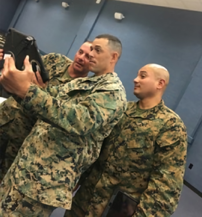 Marines looking at PeBL eBook